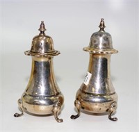 Pair early sterling silver pepperettes