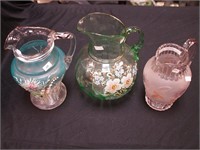 Three vintage water serving pitchers: 9"