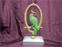 Antique cast iron doorstop. Hubley Parrot.