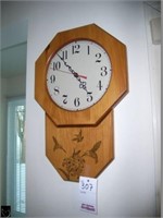 Wooden wall clock w/ engraved hummingbird