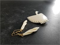 Pair of ivory earrings and an ivory swan pin
