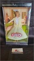 Grease doll