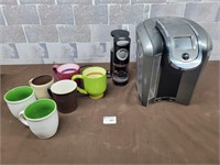 Keurig coffee maker and coffee cups