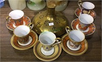 Brass covered glass decanter with 6 cups and