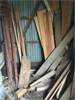 Wood in corner of barn (anything loose)