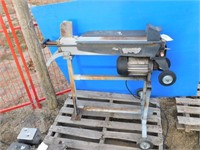 Electric wood splitter on stand