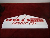 Metal sign. Fred A. Smith Lumber co. 24" by 9.75"