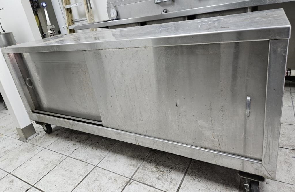 Stainless rolling cart w/ inside shelves and