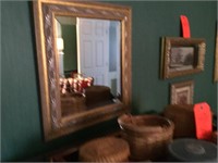 3 mirrors 3 framed prints in master bedroom