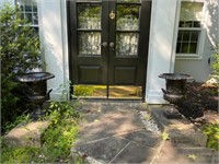 Pair of cast iron planter urns