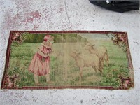 Antique rug/tapestry. Little girl w/sheep.