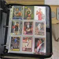 GROUP OF BASKETBALL SPORTS CARDS IN BINDER