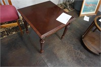Bombay Co. end table on 4-fluted legs with
