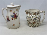 2 pitchers-1 hand painted floral motif, 1 floral