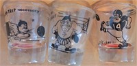 3 shot glasses w/ sports drawing for one money