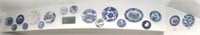 Blue and White Ceramic Plates and Saucers
