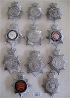 Ten UK Police Bobby helmet plates with