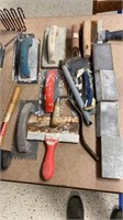 Assortment of tile and drywall tools