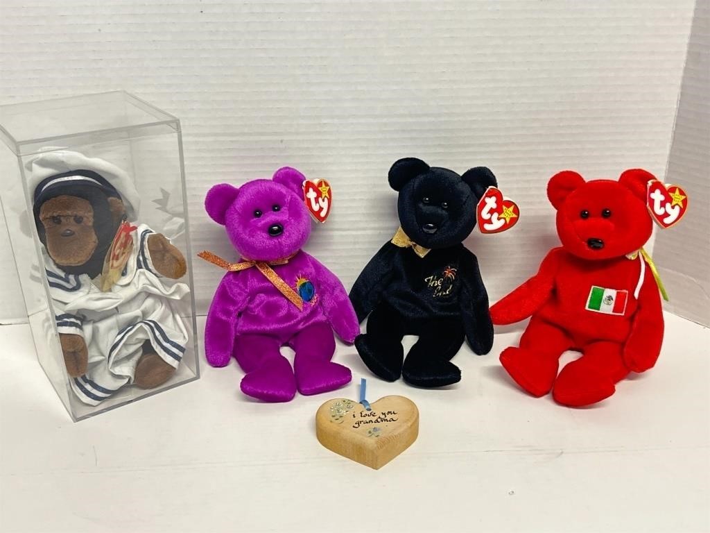 (4) Beanie Babies and One Case plus Small