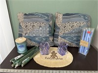 Throw pillows candles and candleholders