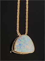 14K lady’s necklace w/ opalescent type pendant.