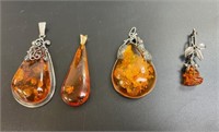 4 VINTAGE AMBER PENDANTS