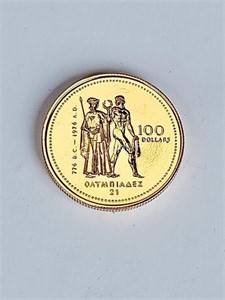 14K 100$ CANADIAN GOLD COIN