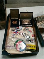 Box of pins and Montana Silversmith belt buckle