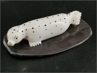 Charles Edwards ivory carving of a seal with balee