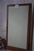Antique sliding door from men's suit display