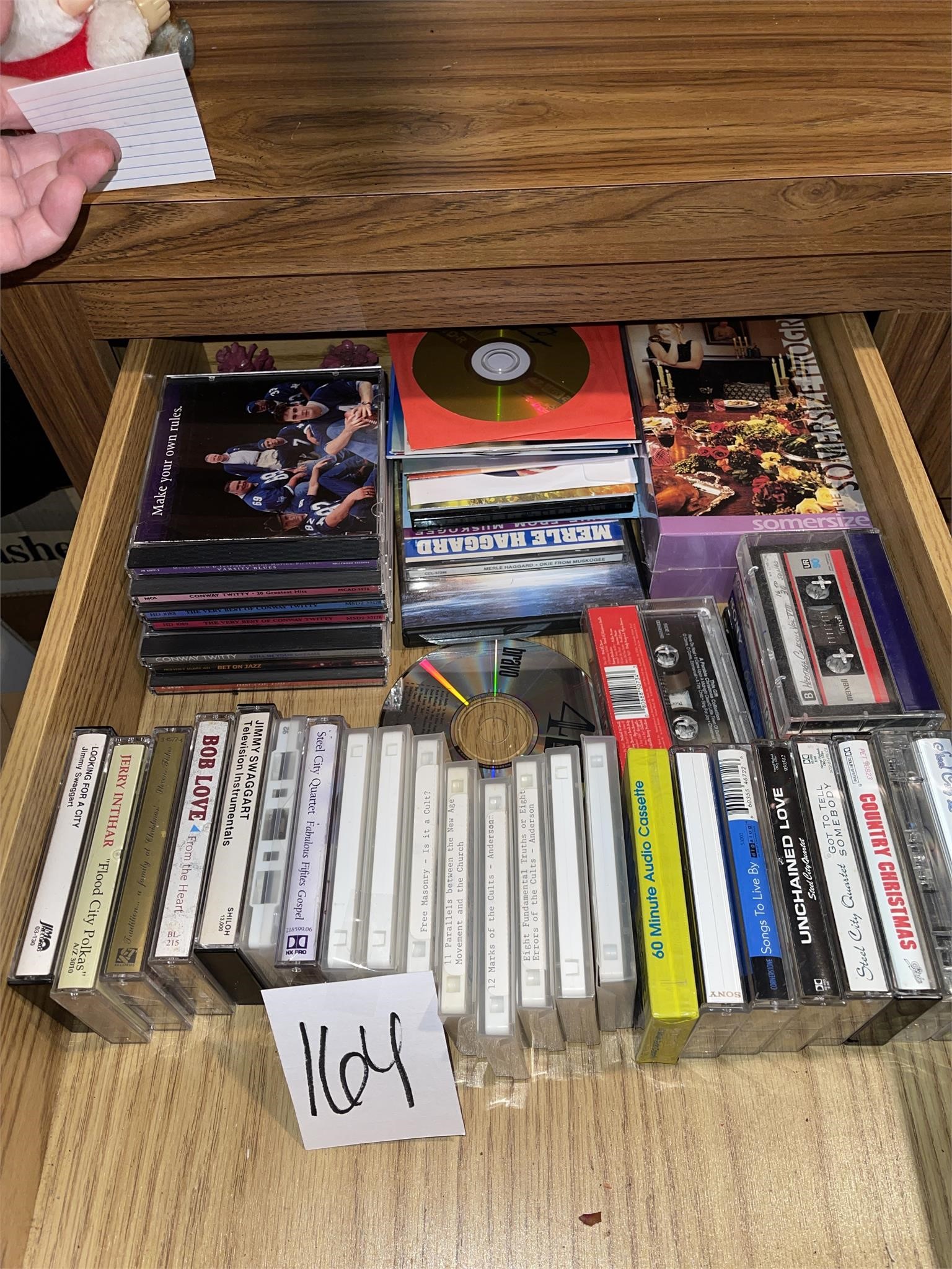 cds cassettes contents of drawer