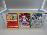 Assortment of Three Pokemon Cards