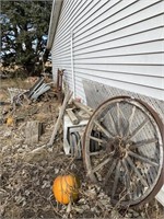 Pile with wagon wheel/wood posts/more