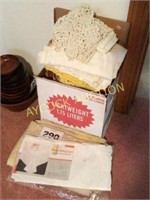 Box of table cloths, placemats, etc.