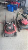 2) lawn mowers one runs, one for parts