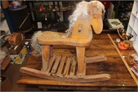 Vintage child’s wooden rocking horse