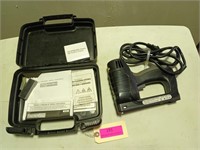 Electric stapler in plastic case