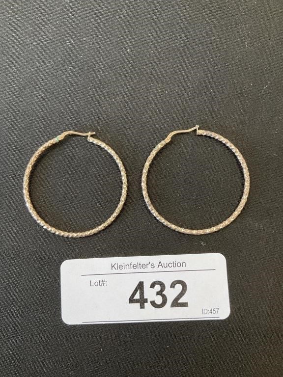 Pair Of Sterling Silver Hoop Earrings.