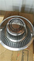 Six vintage Chevrolet Rally hubcaps