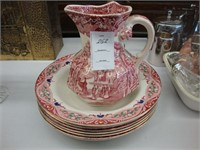 Lot of 7 red and white soup plates along with a