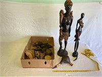 Primitive Pipe and Statues