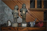 2 children sculptures and 3 birds