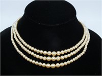 TRIPLE STRAND OF VINTAGE PEARLS W/ S.S. CLASP