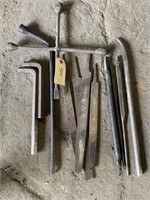 Assorted tools, heavy duty Allen wrenches, tire,