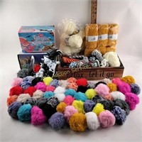 Chenille yarn skeins (12).  Chenille pom poms (2