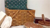 Wood picnic basket with birchbark baskets wall