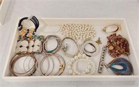 BRACLETS- EARRINGS AND MUCH MORE- LARGE LOT