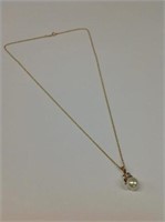 14k yellow gold Pendant & Chain; pendant features