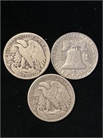 Set of 3 half dollar coins.