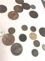 Foreign coins plus tokens